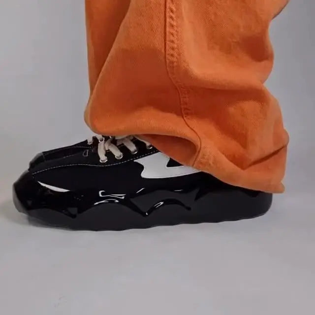 Black glossy Glide soles styled on SWC sneakers